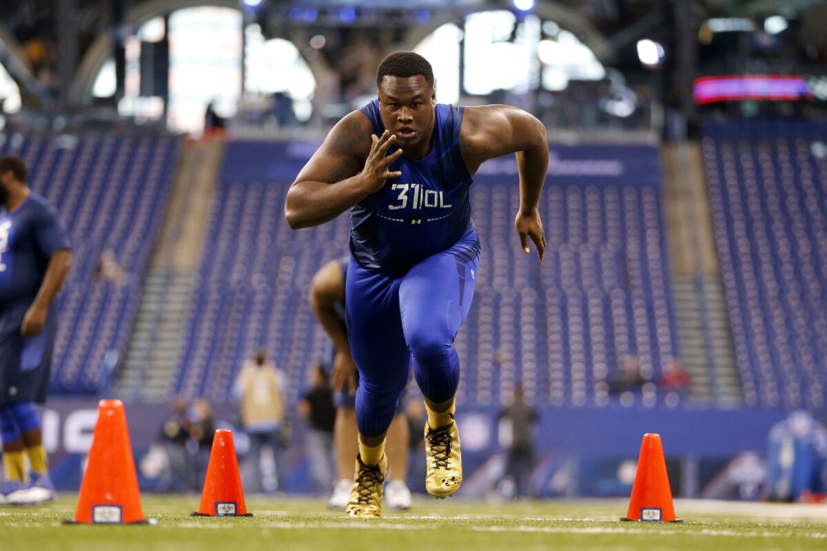 Florida offensive lineman D.J. Humphries runs a drill at the NFL scouting combine on Feb. 20.