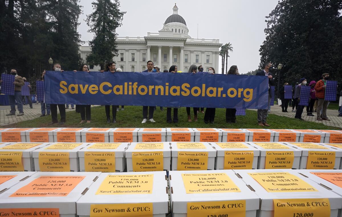 Boxes of petitions against proposed reforms that solar energy advocates claim would handicap the rooftop solar market.