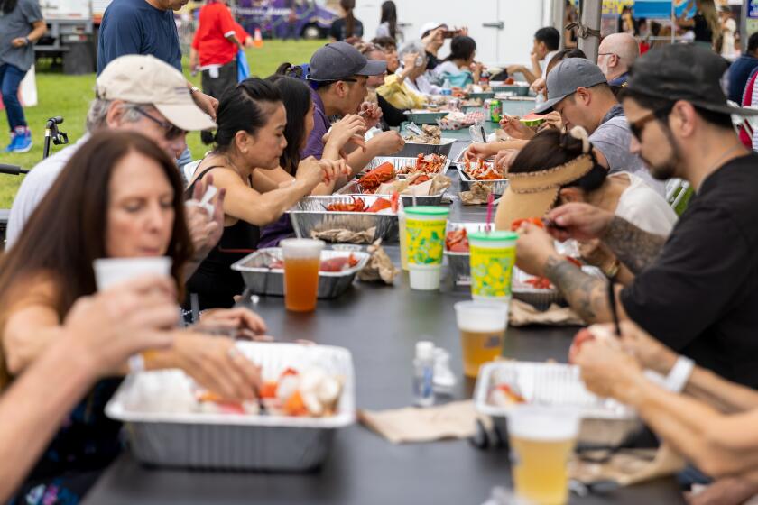 Crowds enjoy Fresh Live Maine Lobster at the Original Lobster Festival held at Fountain Valley Sports Park.