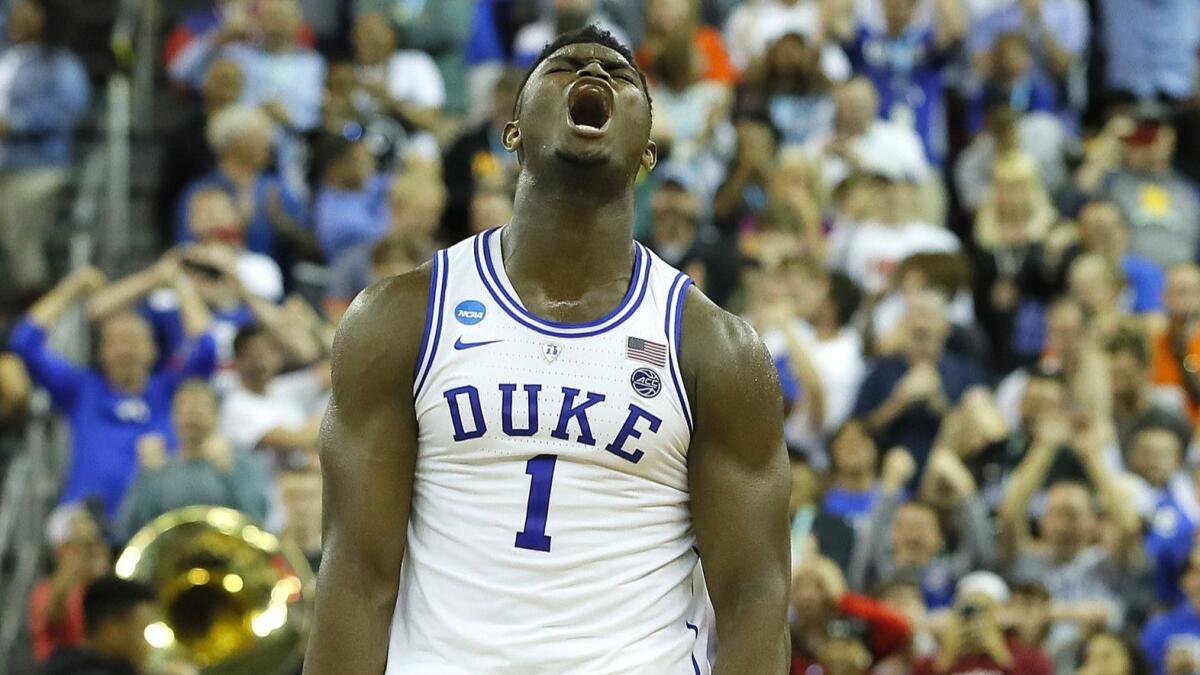 Zion Williamson celebrates Duke's win over Central Florida in the second round of the NCAA tournament.