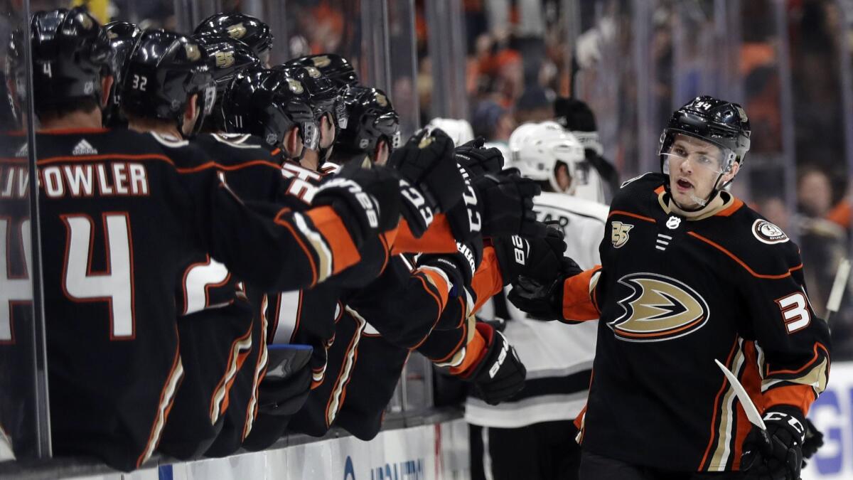 Ducks' Sam Steel, right, celebrates his goal with teammates during the third period against the Kings on April 5, 2019.
