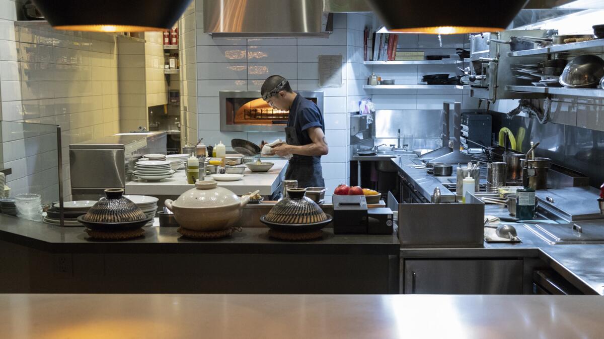 Counter and kitchen at Orsa & Winston restaurant in downtown Los Angeles.