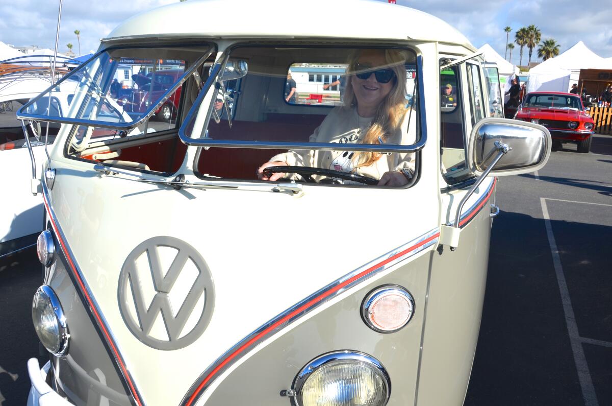 Robin Lewis takes the wheel of her best friend, Tank, a 1966 Volkswagen double-cab pickup.