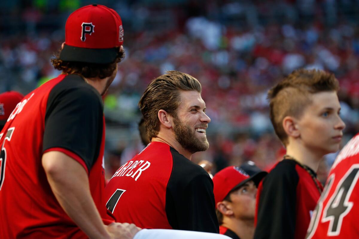 Nationals All-Star outfielder Bryce Harper laughs as he watches the Home Run Derby.