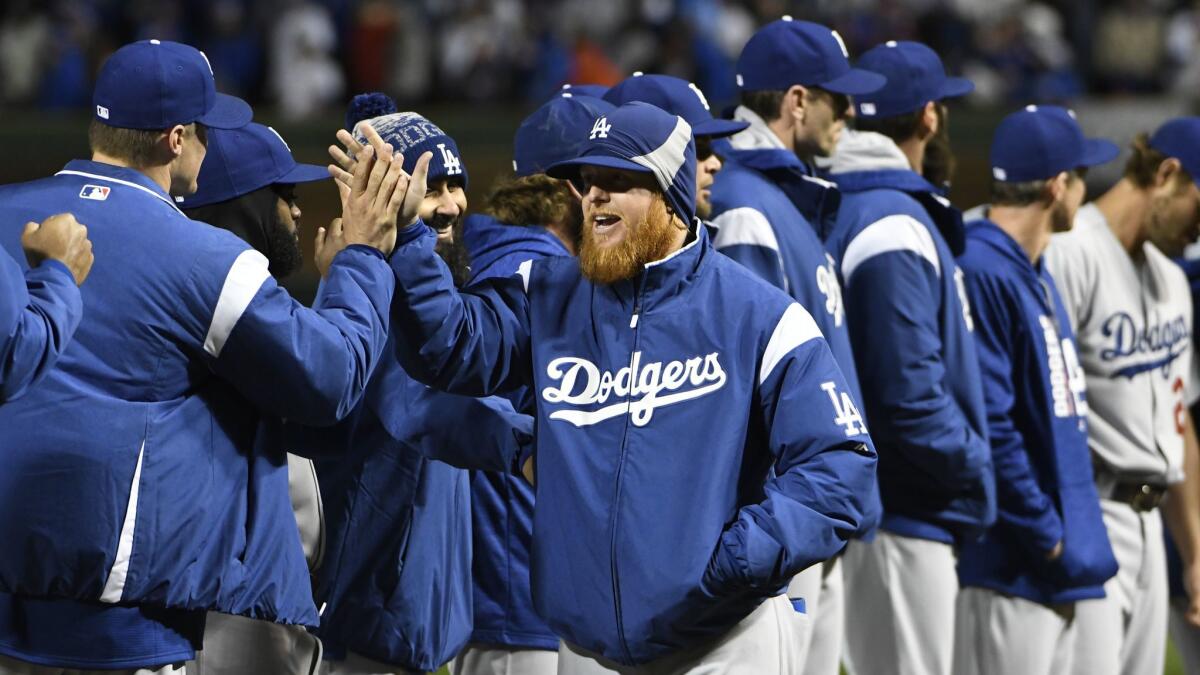 This image features six Brooklyn Dodgers in the dugout of