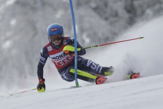 United States' Mikaela Shiffrin speeds down the course during an alpine ski, women's World Cup slalom, in Spindleruv Mlyn, Czech Republic, Saturday, Jan. 28, 2023. (AP Photo/Giovanni Maria Pizzato)