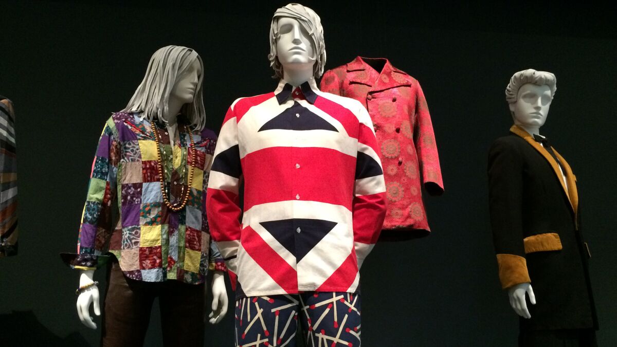 Also in the first gallery are fashions from the mid-20th century, including a patchwork shirt, left, from about 1969, a stylized Union Jack shirt from 1966-67 and a silk Teddy Boy jacket from the 1950s.