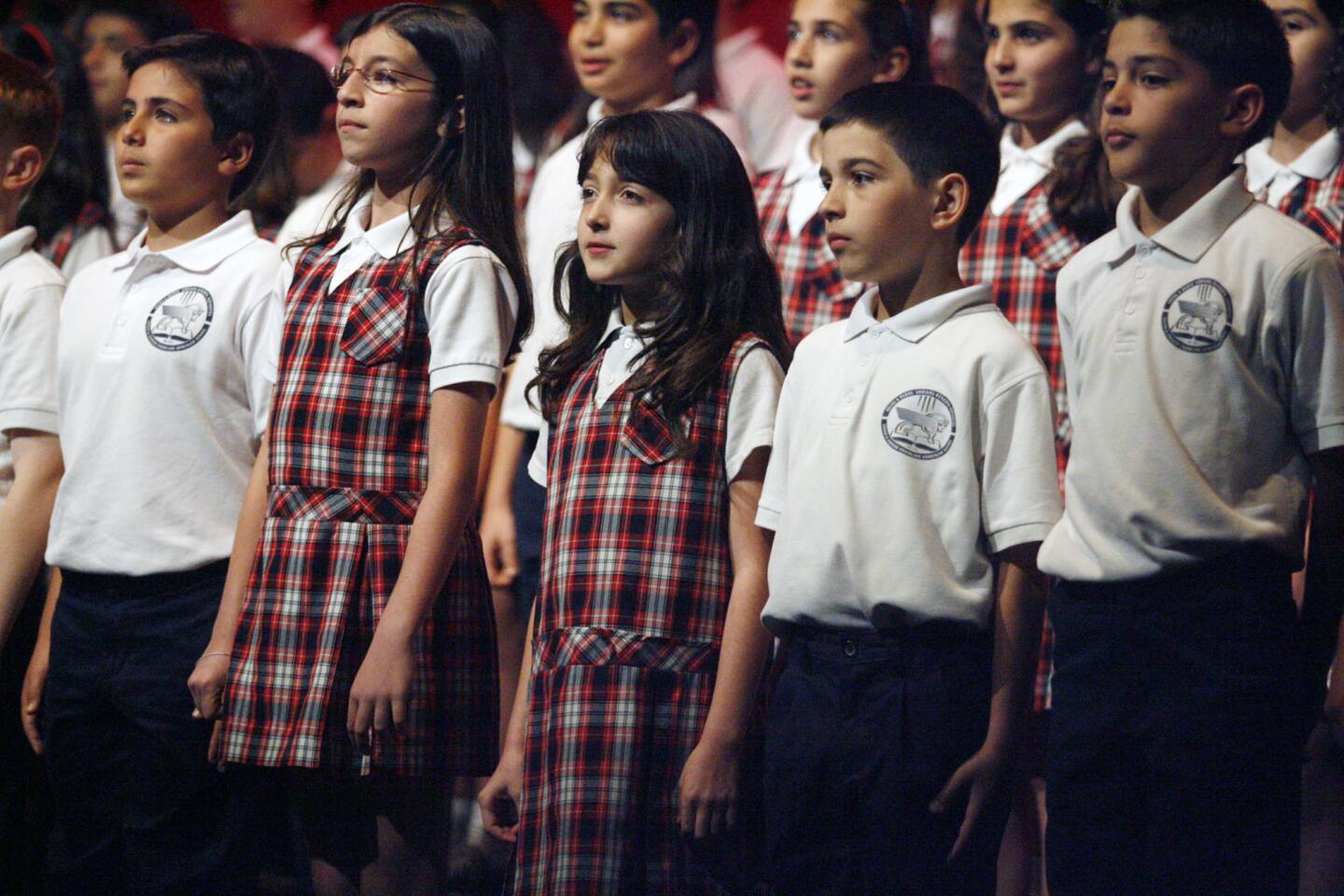 The Chamlian Armenian School Choir performs during the annual Armenian genocide commemoration, which took place a the Alex Theatre in Glendale on Thursday, April 24, 2013.