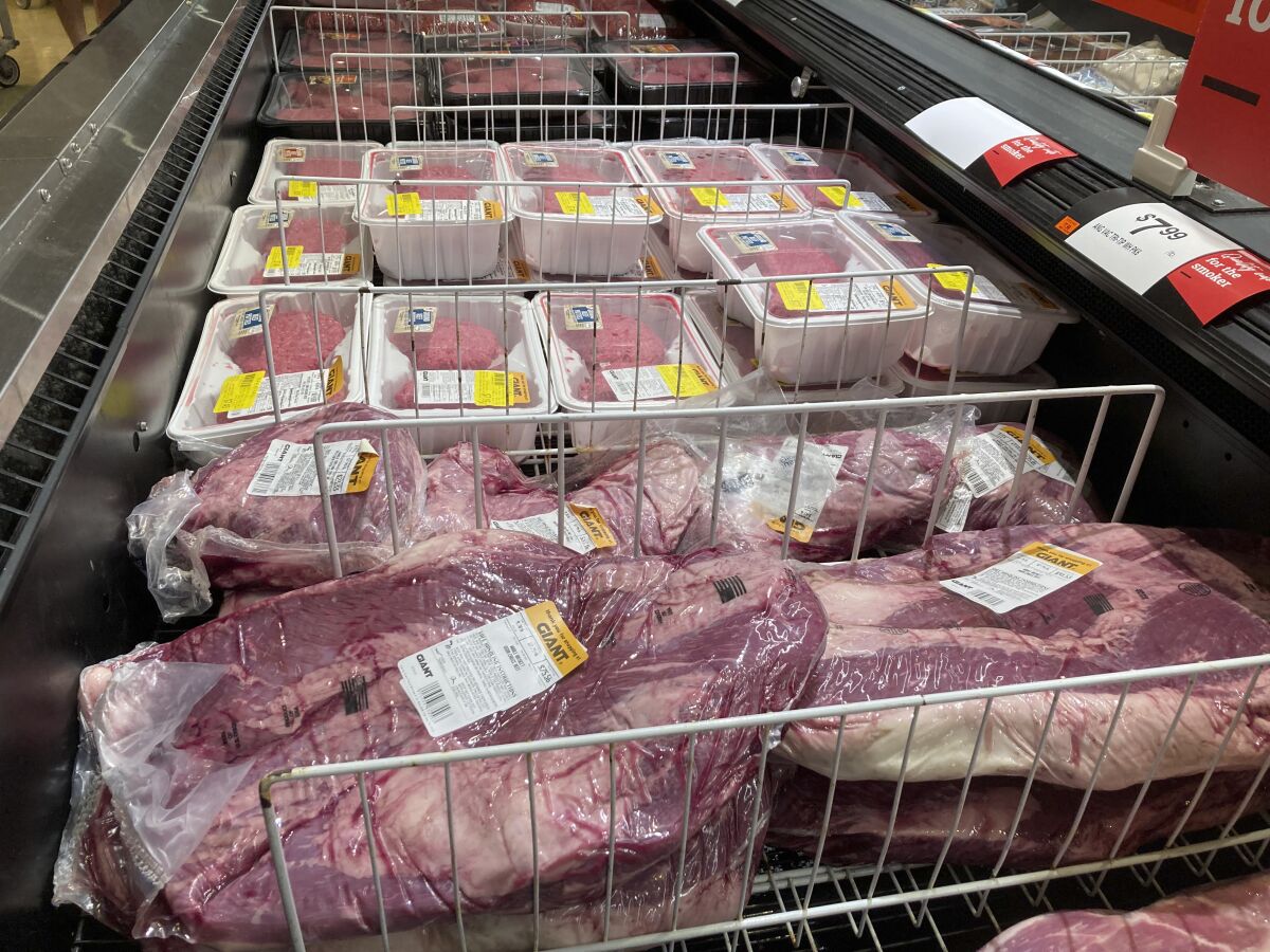 FILE - Shown are meat products at a grocery store in Roslyn, Pa., Tuesday, June 15, 2021. U.S. producer prices soared 11% in April from a year earlier, a hefty gain that indicates high inflation will remain a burden for consumers and businesses in the months ahead. The Labor Department said Thursday, May 12, 2022, that its producer price index — which measures inflation before it reaches consumers — climbed 0.5% in April from March. (AP Photo/Matt Rourke, File)