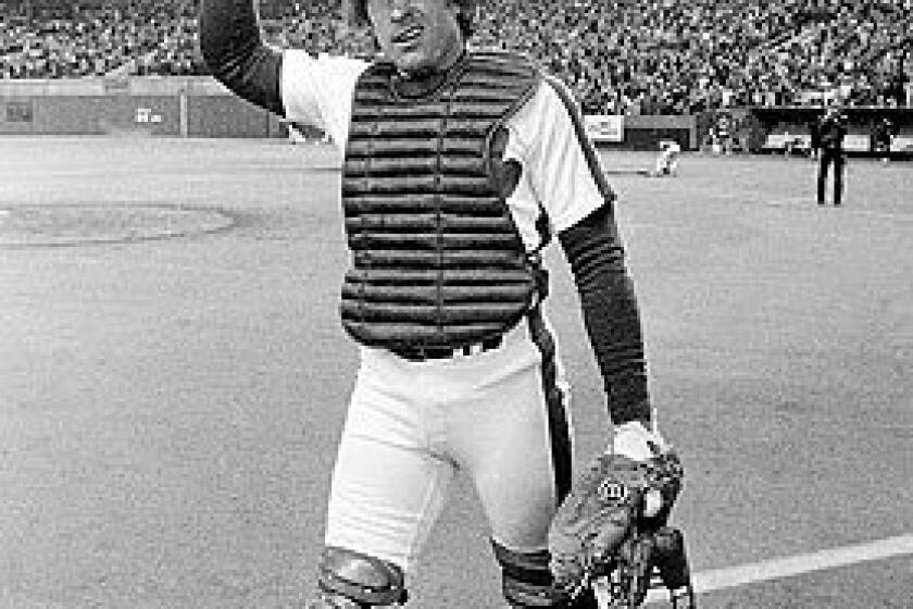 Montreal catcher Gary Carter salutes and winks at the cheering crowd as he leaves the field after the Expos defeated the Philadelphia Phillies, 3-1, to take a 2-0 lead in the 1981 National League East Division playoffs.