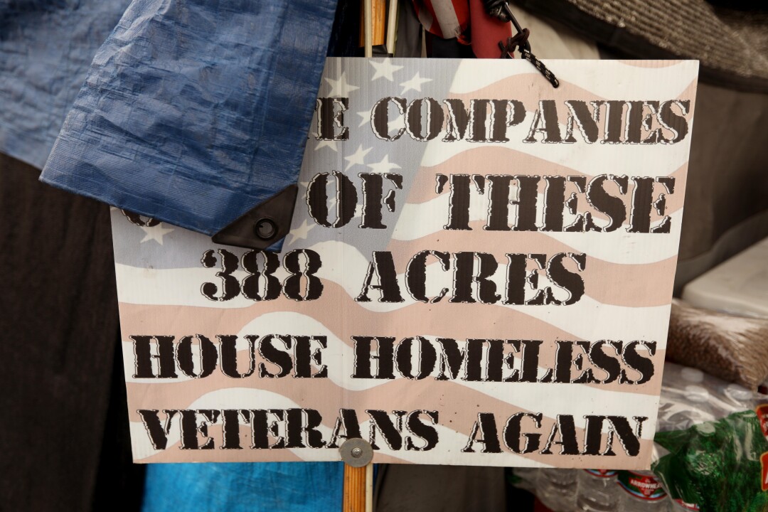 A sign in support of the home of homeless veterinarians.