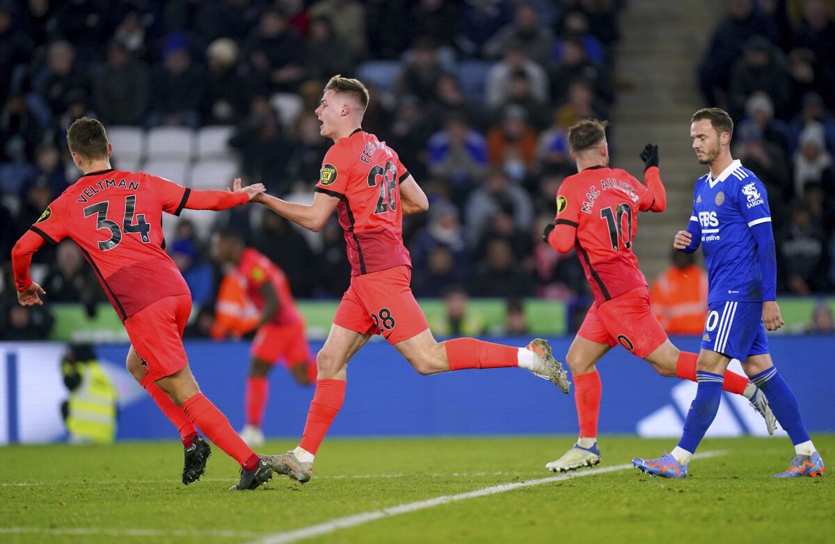 Brighton's Evan Ferguson, second left, celebrates scoring their second goal of the game during the English Premier League soccer match between Leicester City and Brighton & Hove Albion at the King Power Stadium, Leicester, England, Saturday, Jan. 21, 2022. (Mike Egerton/PA via AP)