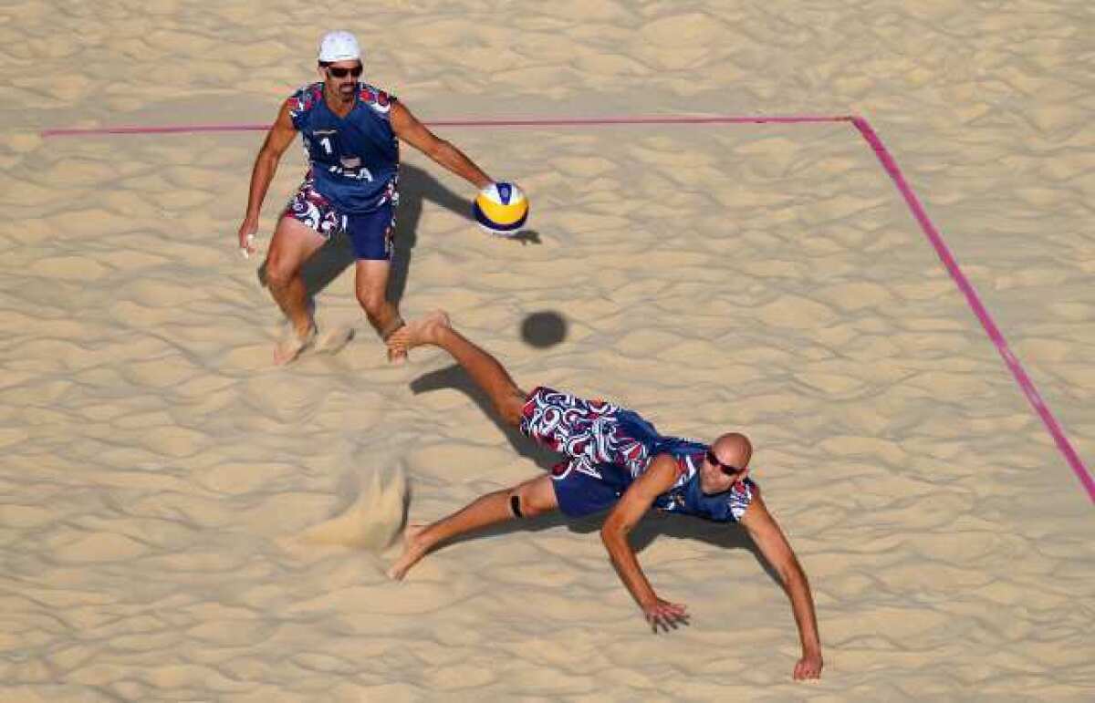 Todd Rogers, left, and Phil Dalhausser will return home without an Olympic medal.