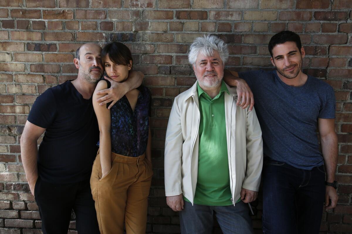 Director Pedro Almodovar, second from right, poses for a portrait with actors, Javier Camara, left, Blanca Suarez, second from left, and Miguel Angel Silvestre, right, from his latest film, "I'm so Excited!"