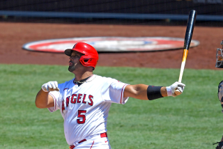 Albert Pujols hits a grand slam against the Houston Astros on Aug. 2 at Angel Stadium.