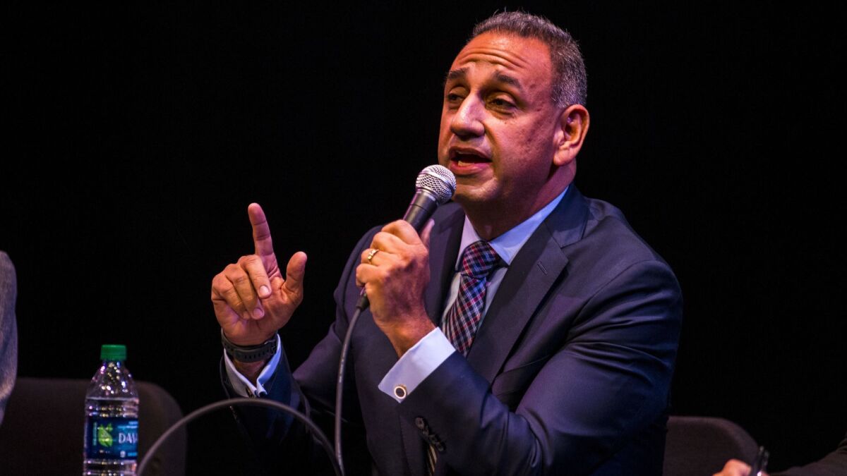 Gil Cisneros, a Democrat, is running against Republican Young Kim for California's 39th District congressional seat.