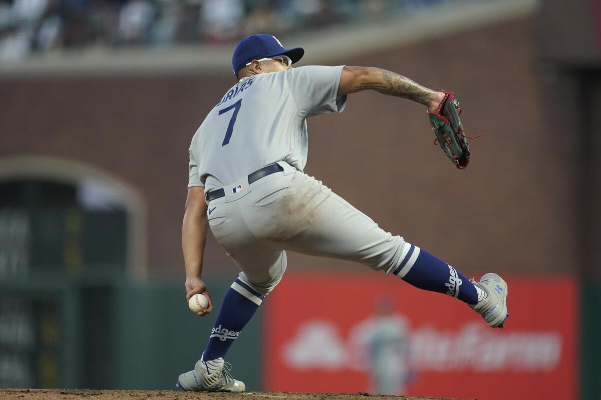 Julio Urias pitches against the Giants on Aug. 3 in San Francisco.