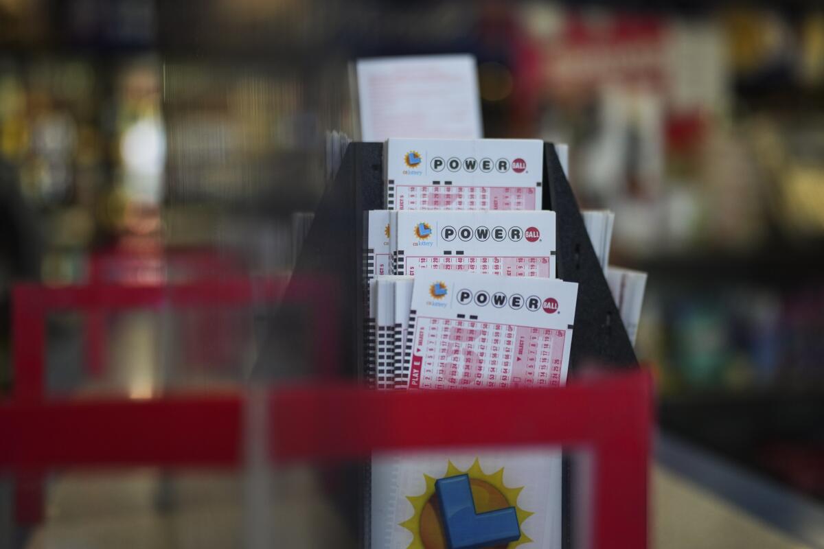 Powerball playslips in a display case in a liquor store