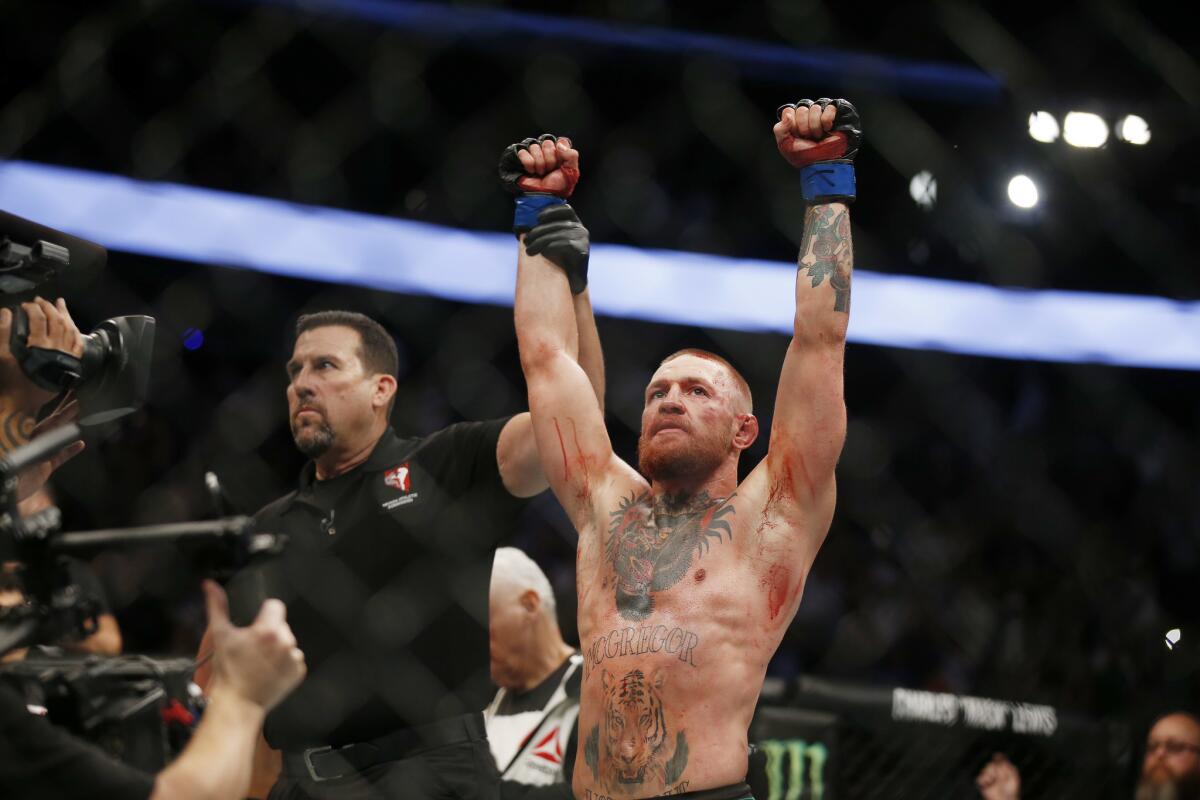 Conor McGregor reacts after defeating Nate Diaz on Aug. 20.