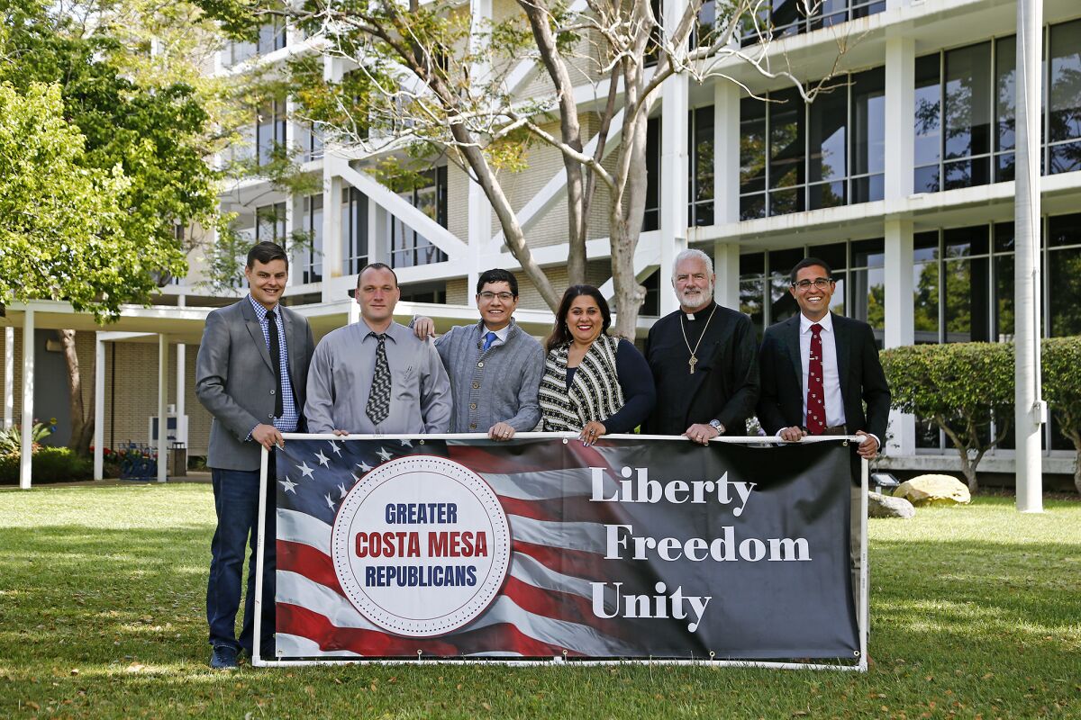  Hengameh "Henny" Abraham, fourth from left, co-founded the Greater Costa Mesa Republicans in 2021.