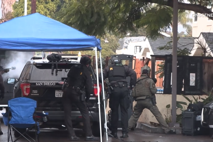 San Diego police during standoff at Mountain View home Monday 