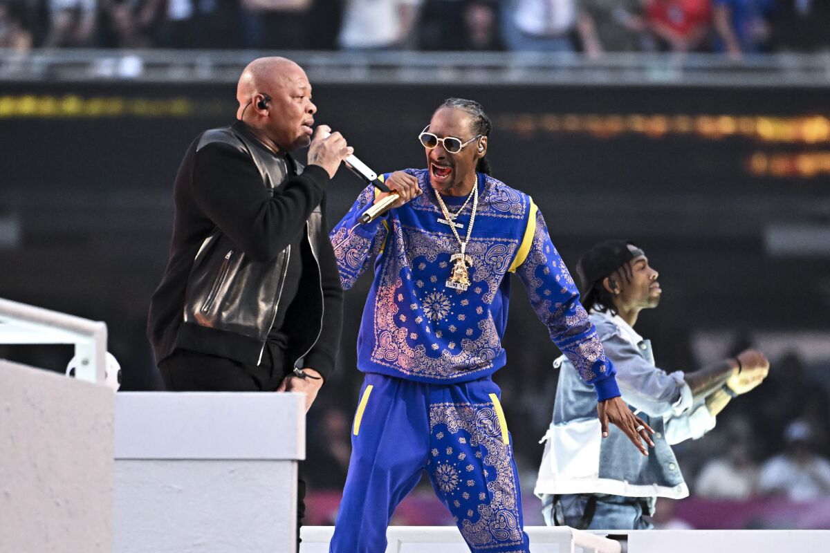 Dr. Dre and Snoop Dogg perform during halftime in Super Bowl LVI.
