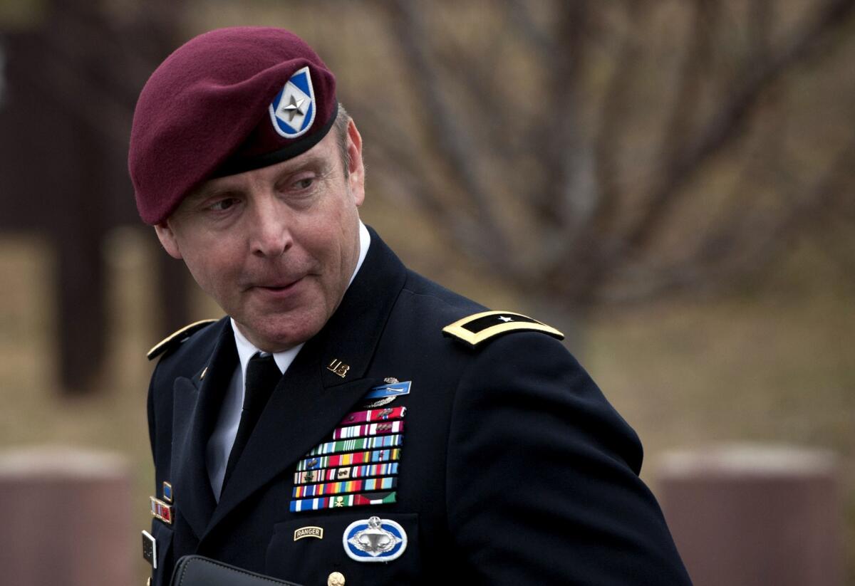 Army Brig. Gen. Jeffrey A. Sinclair leaves the Ft. Bragg, N.C., courthouse after sexual assault charges against him were dropped and he entered a guilty plea to lesser charges.