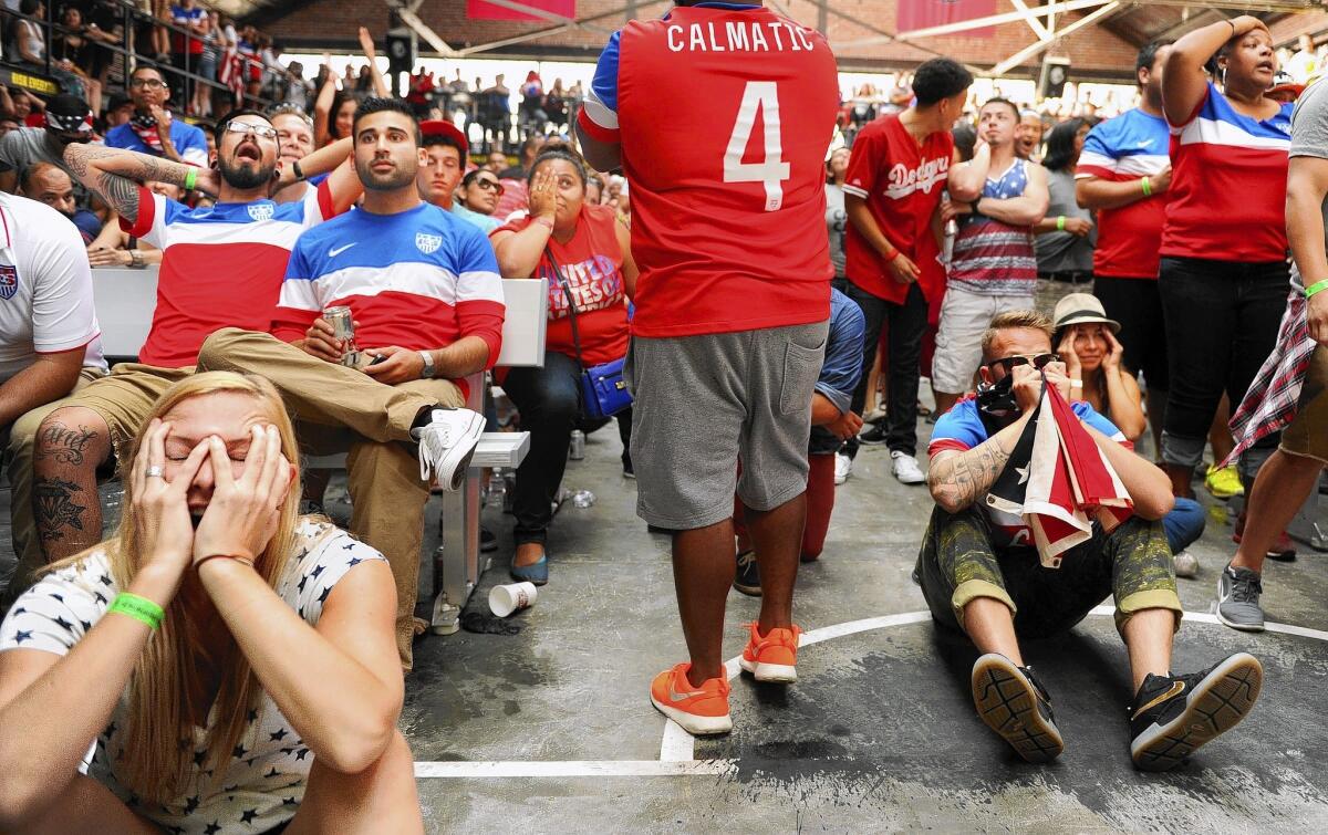 Fans at a World Cup viewing party in downtown L.A. can't bear to look after the U.S. gave up the tying goal against Portugal. There was a second viewing party at Lot 613 in the Arts District. The teams ended up in a 2-2 tie.