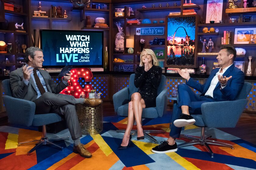 WATCH WHAT HAPPENS LIVE WITH ANDY COHEN -- Pictured (l-r): Andy Cohen, Kelly Ripa and Ryan Seacrest -- (Photo by: Charles Sykes/Bravo/NBCU Photo Bank/NBCUniversal via Getty Images)