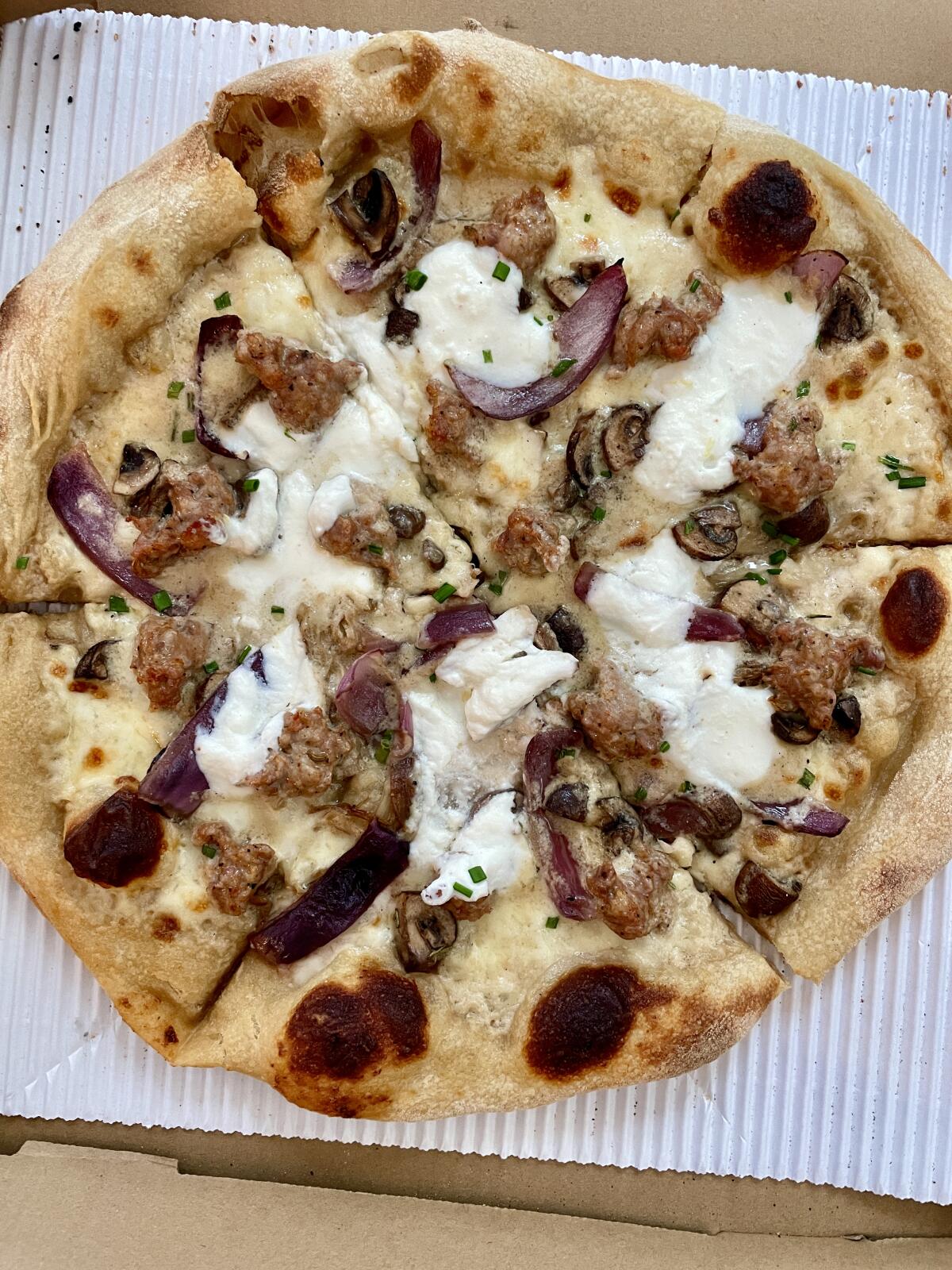 Caro Mio's Creamy Combo pizza, a pop-up pizza at Maury's Bagels in Silverlake.