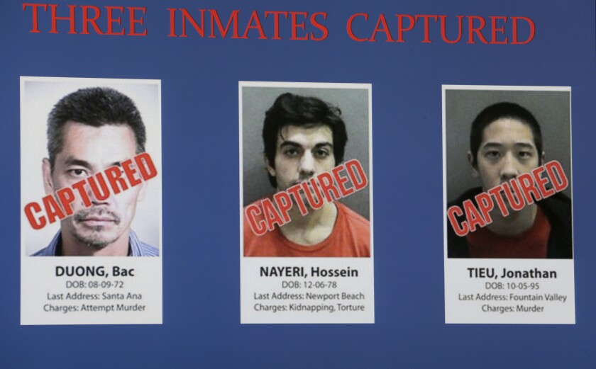 FILE - Three captured inmates, from left to right: Bac Tien Duong, Hossein Nayeri, and Jonathan Tieu, are displayed on a video monitor at an Orange County Sheriff's news conference in Santa Ana, Calif., Feb. 1, 2016. One of three men who carried out a daring, elaborate escape from a Southern California jail has been sentenced to 20 years in prison. Duong, 49, was sentenced both for the 2016 breakout and for attempted murder in the case that first got him locked up. (AP Photo/Nick Ut, File)
