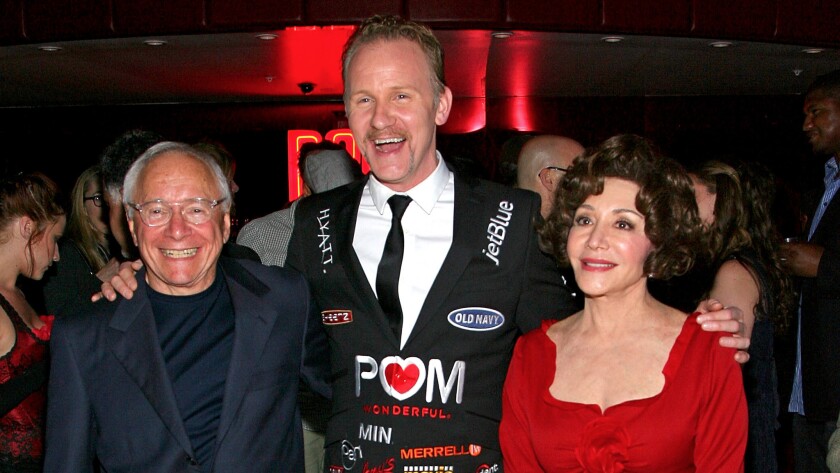 Wonderful Co. owners Stewart Resnick and Lynda Resnick flank film director Morgan Spurlock at the 2011 premiere of a Wonderful-sponsored film.