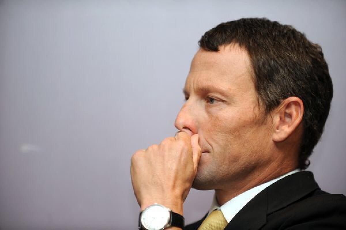 Lance Armstrong won't be participating in a swimming competition in Texas this weekend after the sports' international federation body objected.