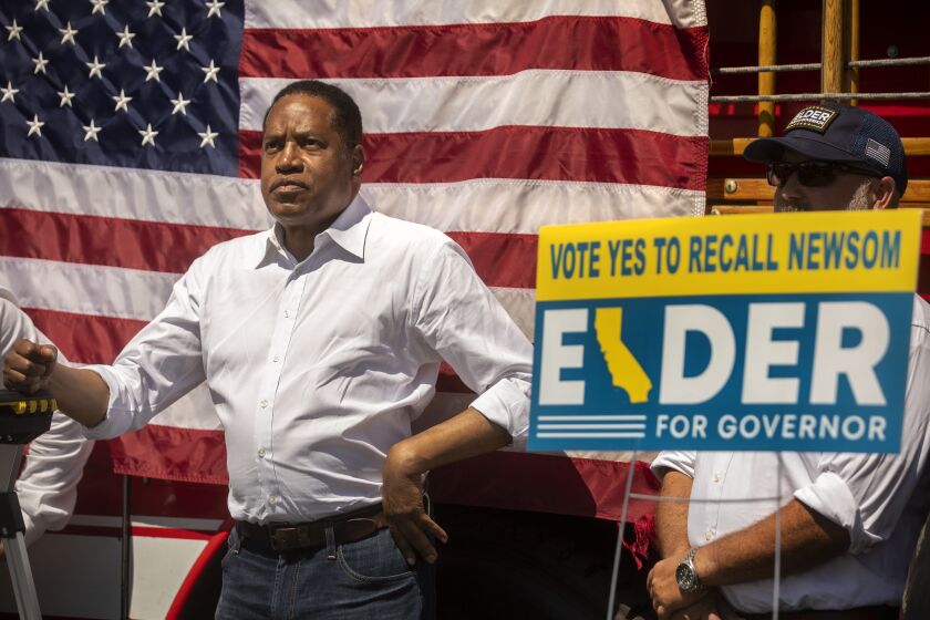 Thousand Oaks, CA - SEPTEMBER 06, 2021: Gubernatorial candidate Larry Elder waits to be introduced during a rally in the parking lot of The Oaks shopping mall in Thousand Oaks. (Mel Melcon / Los Angeles Times)