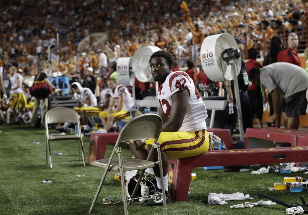 USC linebacker Abdul-Malik McClain sits on the bench during a 2018 game against Texas.