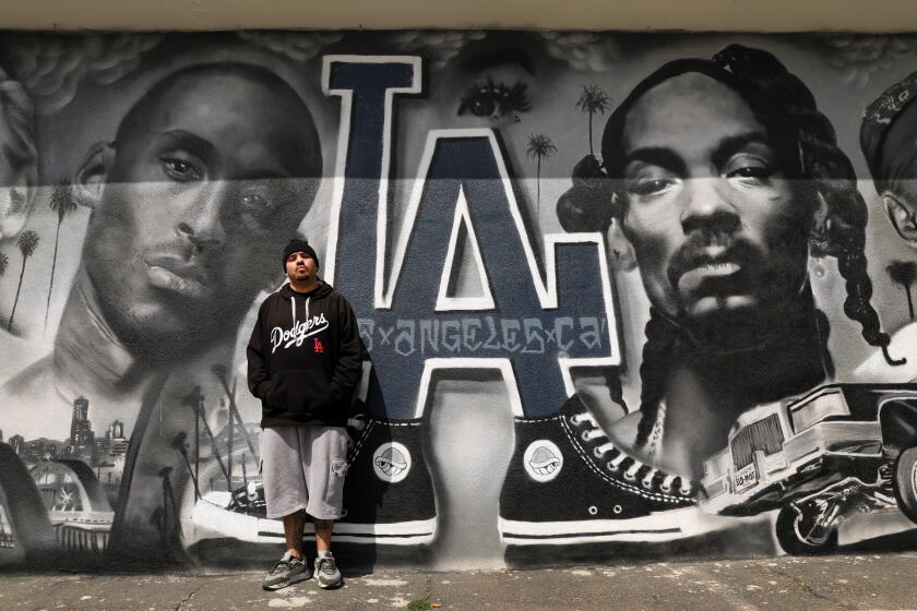 Real Rapper Murals 'NBA 2K' saves Kobe and Gianna Bryant mural in downtown L.A. - Los ...