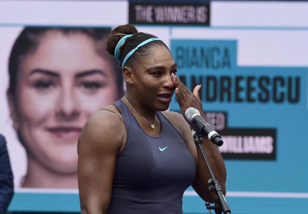 Serena Williams holds back tears while talking at the Rogers Cup.