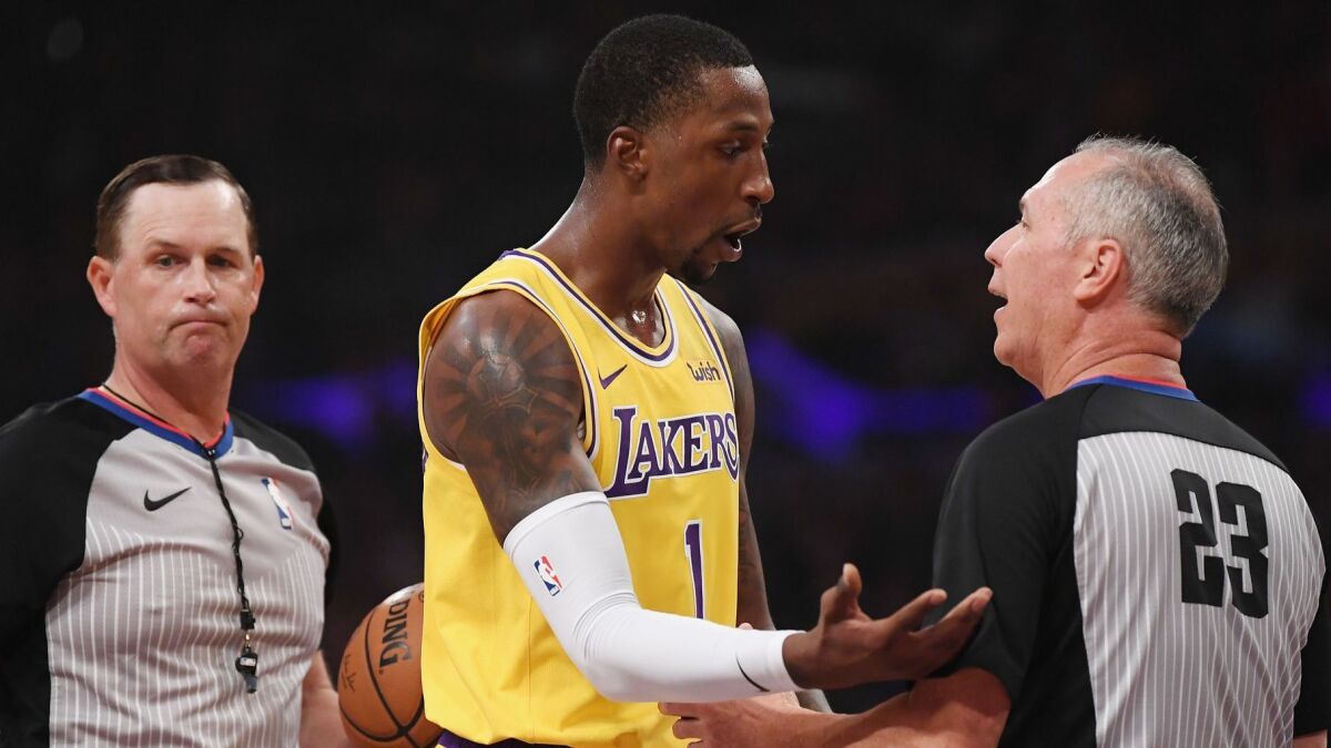 Lakers guard Kentavious Caldwell-Pope argues a call with referee Jason Phillips during the first half Saturday night.