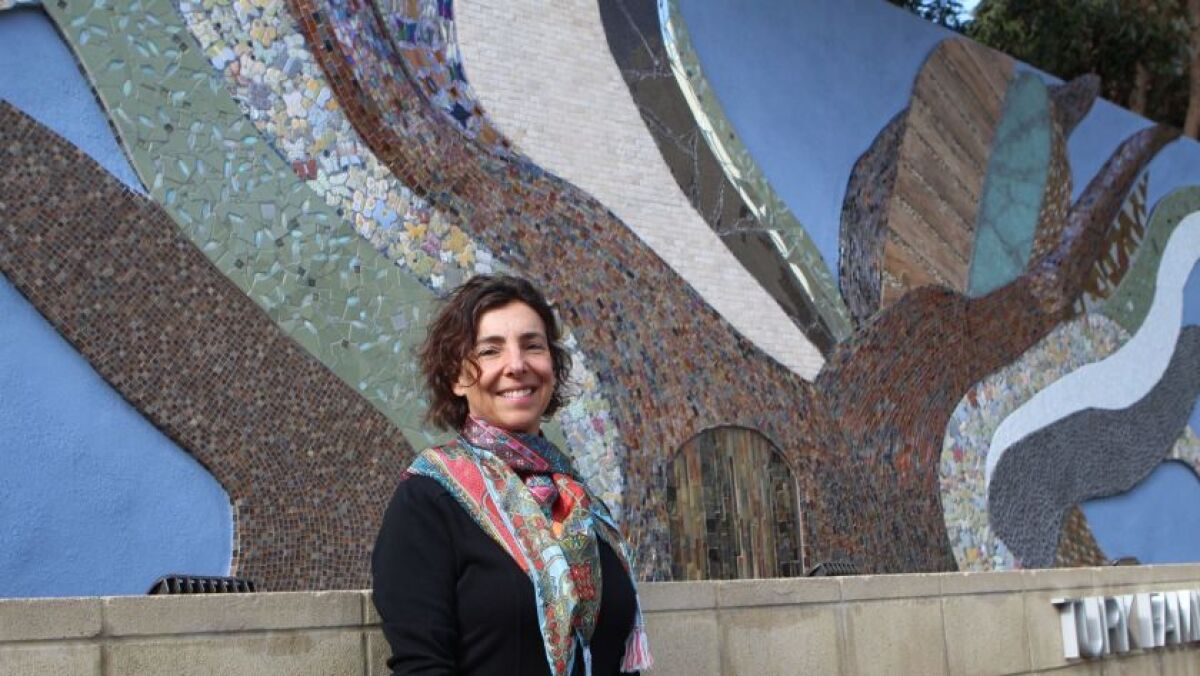 Helen Segal with her "Tree of Life" holocaust memorial at Beth El in La Jolla.