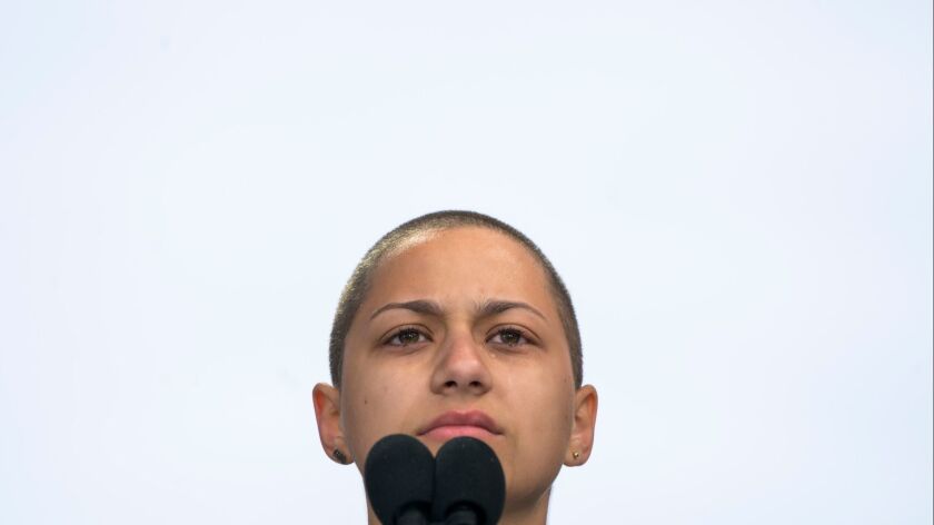 Emma Gonzalez, a survivor of the school shooting in Parkland, Fla., cried silently at the March for Our Lives in Washington, D.C., in March.