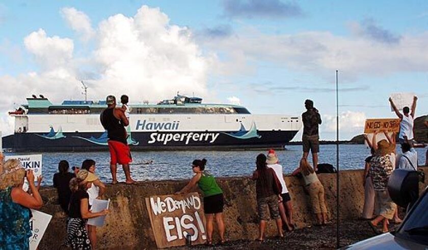 Residents of the island of Kauai protest the arrival of the Hawaii Superferry in August. Islanders, in the face of Coast Guard gunboats, formed a floating blockade at the harbor entrance and, after a three-hour standoff, forced the $85-million ferry to turn back to Honolulu.