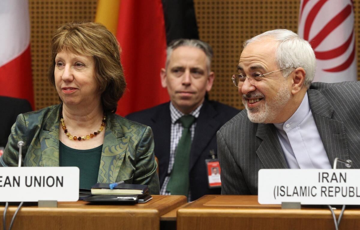 Catherine Margaret Ashton, the European Union's foreign police chief, sits beside Iranian Foreign Minister Javad Mohammad Zarif during nuclear talks Tuesday at the U.N. headquarters in Vienna.