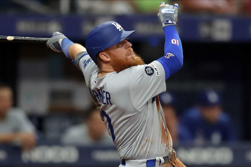 ST. PETERSBURG, FL - MAY 21: Justin Turner #10 of the Los Angeles Dodgers hits a fly ball in the seventh inning against the Tampa Bay Rays at Tropicana Field on May 21, 2019 in St. Petersburg, Florida. (Photo by Mike Carlson/Getty Images) ** OUTS - ELSENT, FPG, CM - OUTS * NM, PH, VA if sourced by CT, LA or MoD **