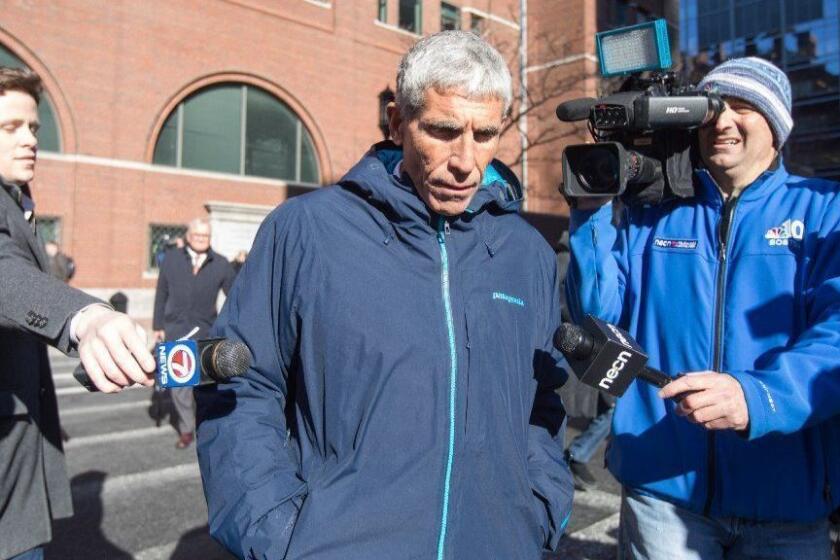 BOSTON, MA - MARCH 12: William "Rick" Singer leaves Boston Federal Court after being charged with racketeering conspiracy, money laundering conspiracy, conspiracy to defraud the United States, and obstruction of justice on March 12, 2019 in Boston, Massachusetts. Singer is among several charged in an alleged college admissions scam involving parents, ACT and SAT administrators and coaches at universities including Stanford, Georgetown, Yale, and the University of Southern California. (Photo by Scott Eisen/Getty Images) ** OUTS - ELSENT, FPG, CM - OUTS * NM, PH, VA if sourced by CT, LA or MoD **