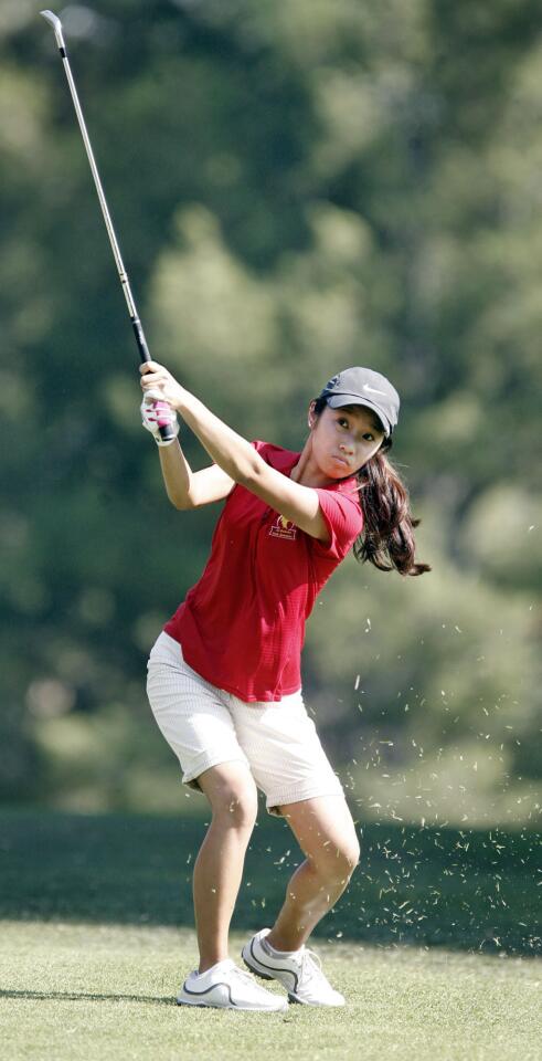 La Canada's Jennifer Kim swings at the ball during a match against South Pasadena at La Canada Flintridge Country Club on Tuesday, September 6, 2011.