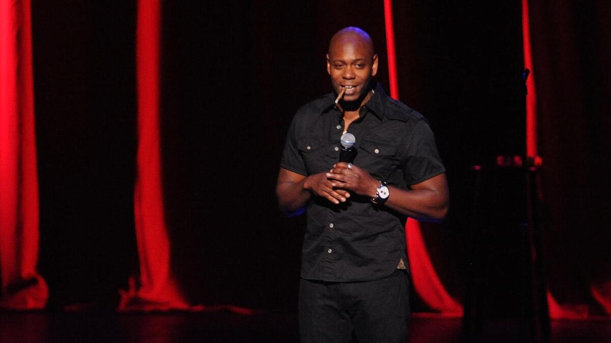 Dave Chappelle performs at Radio City Music Hall in 2014. Chappelle is scheduled to host "Saturday Night Live" for the first time on Nov. 12.