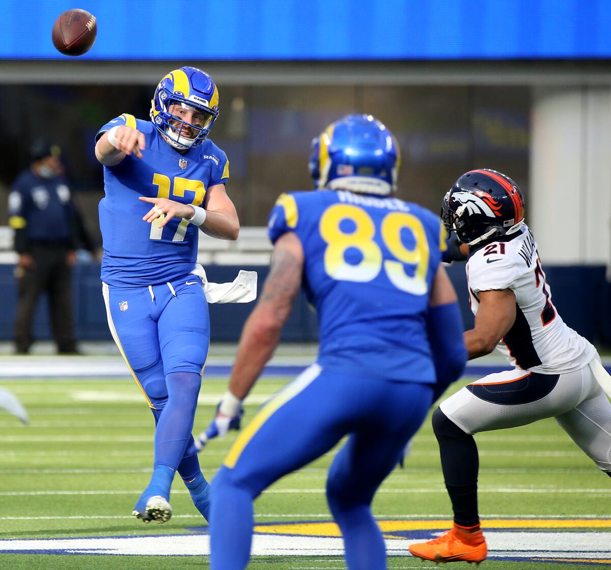 Rams quarterback Baker Mayfield throws to tight end Tyler Higbee against the Denver Broncos.