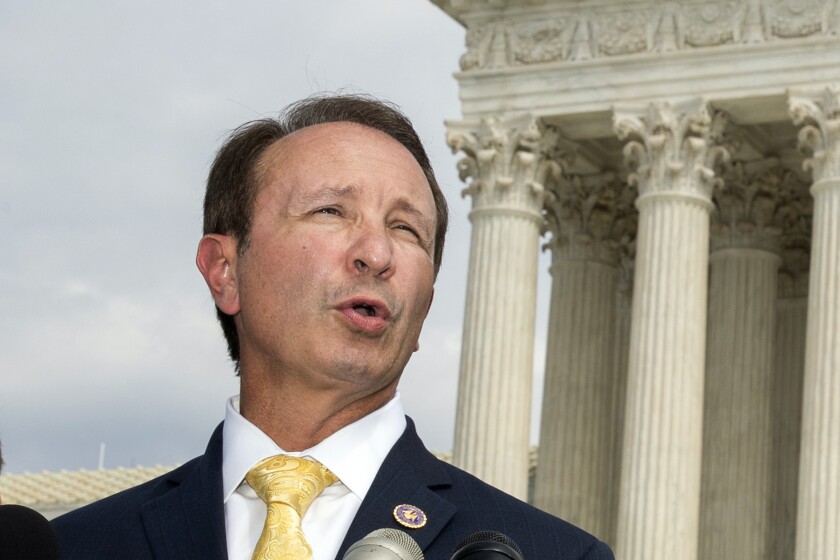 FILE - In this Sept. 9, 2019, file photo, Louisiana Attorney General Jeff Landry speaks in front of the U.S. Supreme Court in Washington. The Biden administration’s suspension of new oil and gas leases on federal land and water was blocked Tuesday, June 15, 2021, by a federal judge in Louisiana. U.S. District Judge Terry Doughty's ruling came in a lawsuit filed in March by Louisiana’s Republican attorney general, Jeff Landry and officials in 12 other states. Doughty's ruling granting a preliminary injunction to those states said his order applies nationwide. (AP Photo/Manuel Balce Ceneta, File)