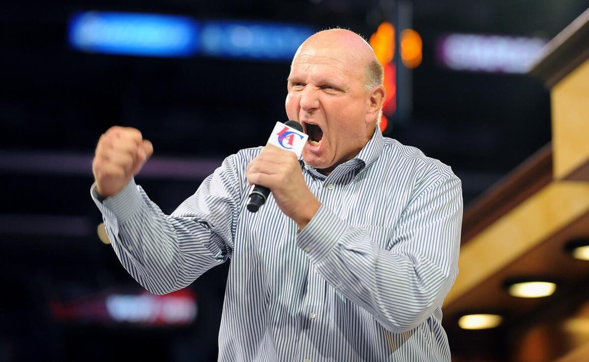 New Clippers owner Steve Ballmer speaks during a rally at Staples Center on Monday.