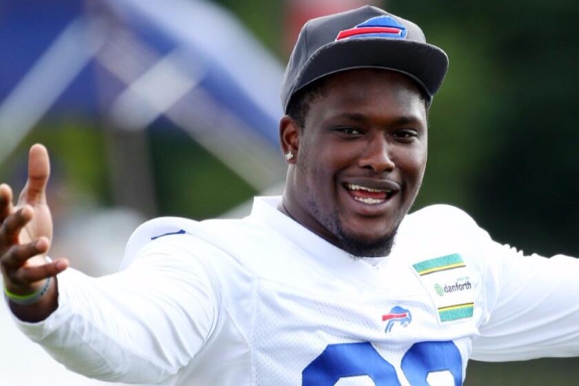 Bills running back Karlos Williams smiles during the team's conditioning drills at training camp on July 31.